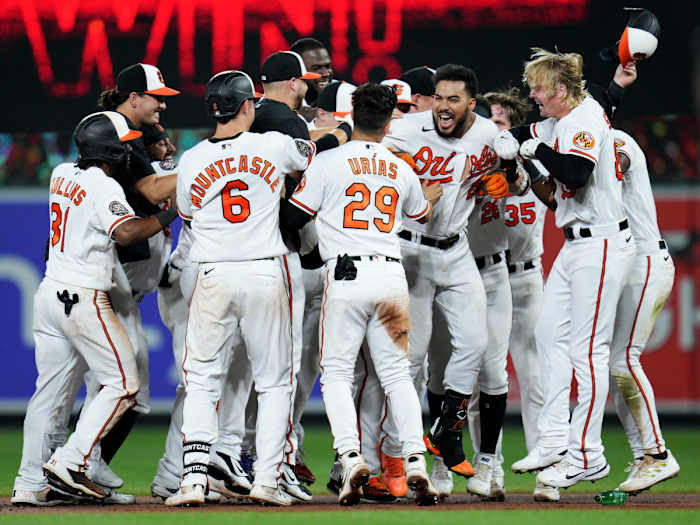 Aug 25, 2022; Baltimore, Maryland, USA; The Baltimore Orioles celebrate designated hitter Anthony Santander’s (25) walk-off hit against the Chicago White Sox at Oriole Park at Camden Yards.